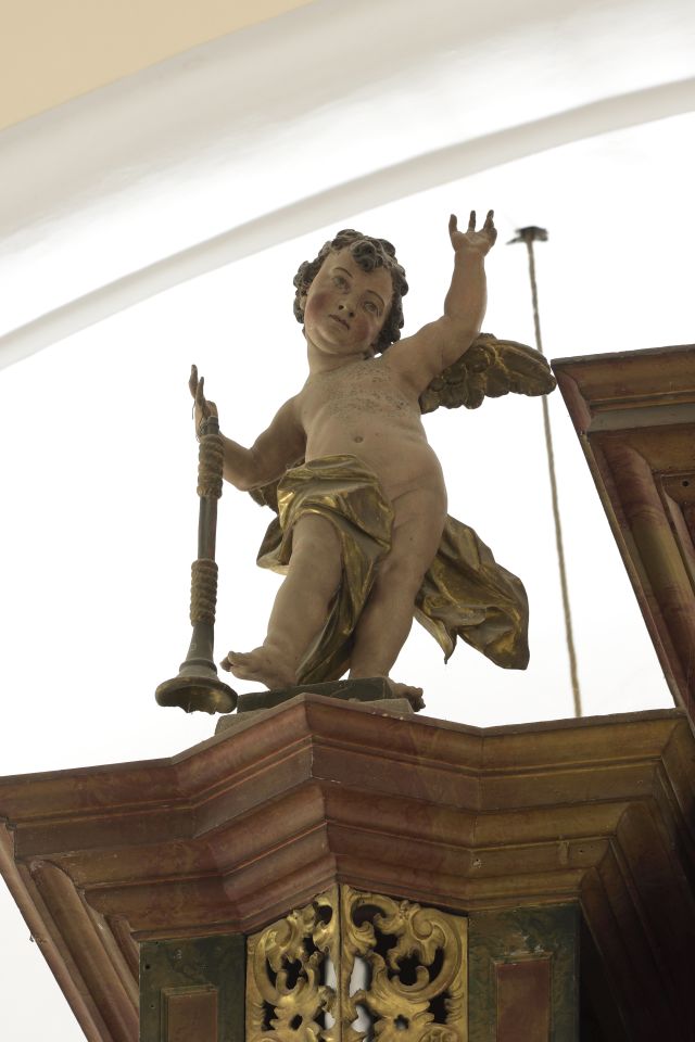 Varaždin, Ursuline church, organ, sculpture of the left putto (Croatian Conservation Institute Photo Archive, photo by Miroslav Pavličić, 2018)