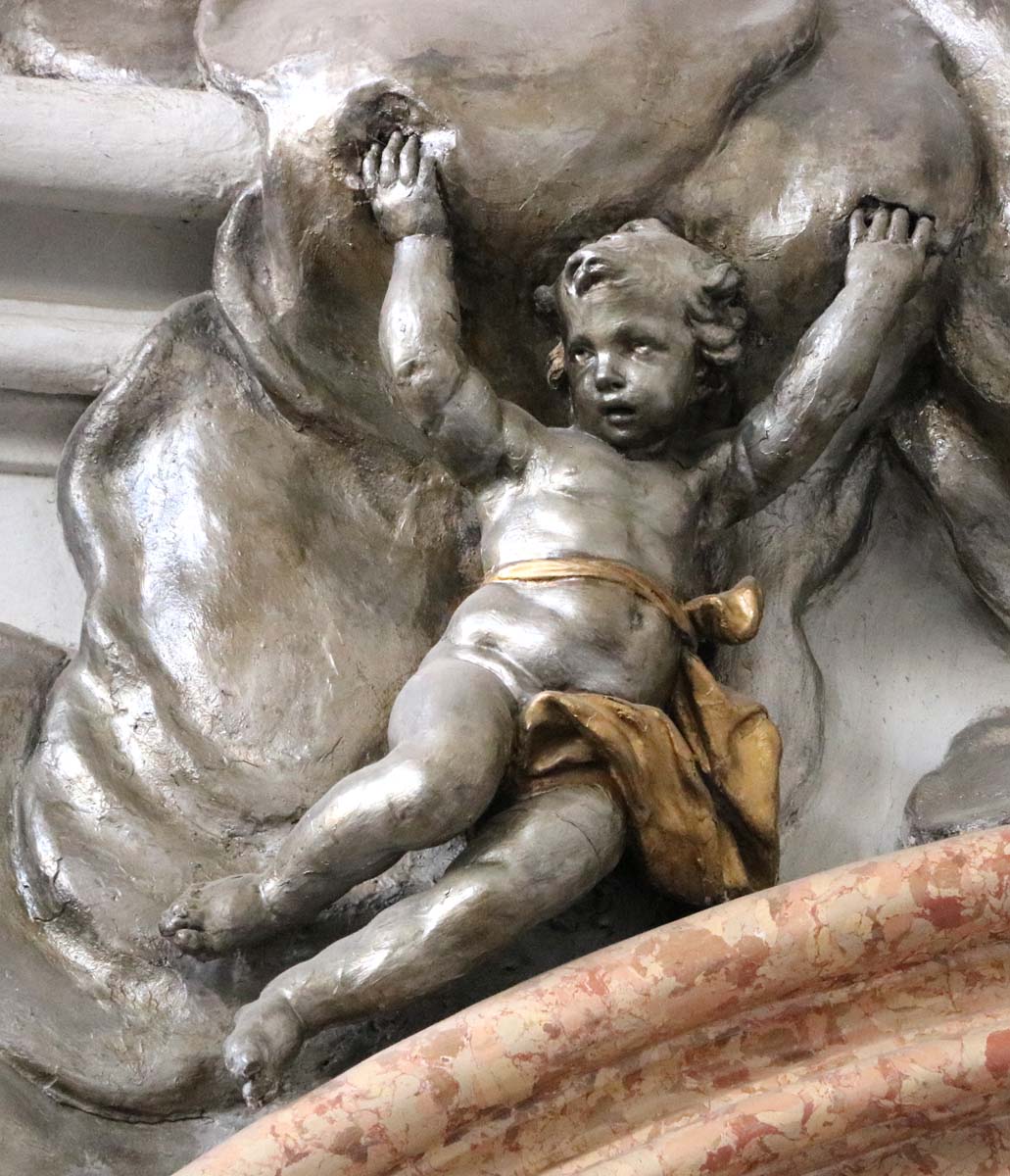 Vienna, St Augustine, putto above the right altar at the triumphal arch (photo by Julia Strobl, 2018)
