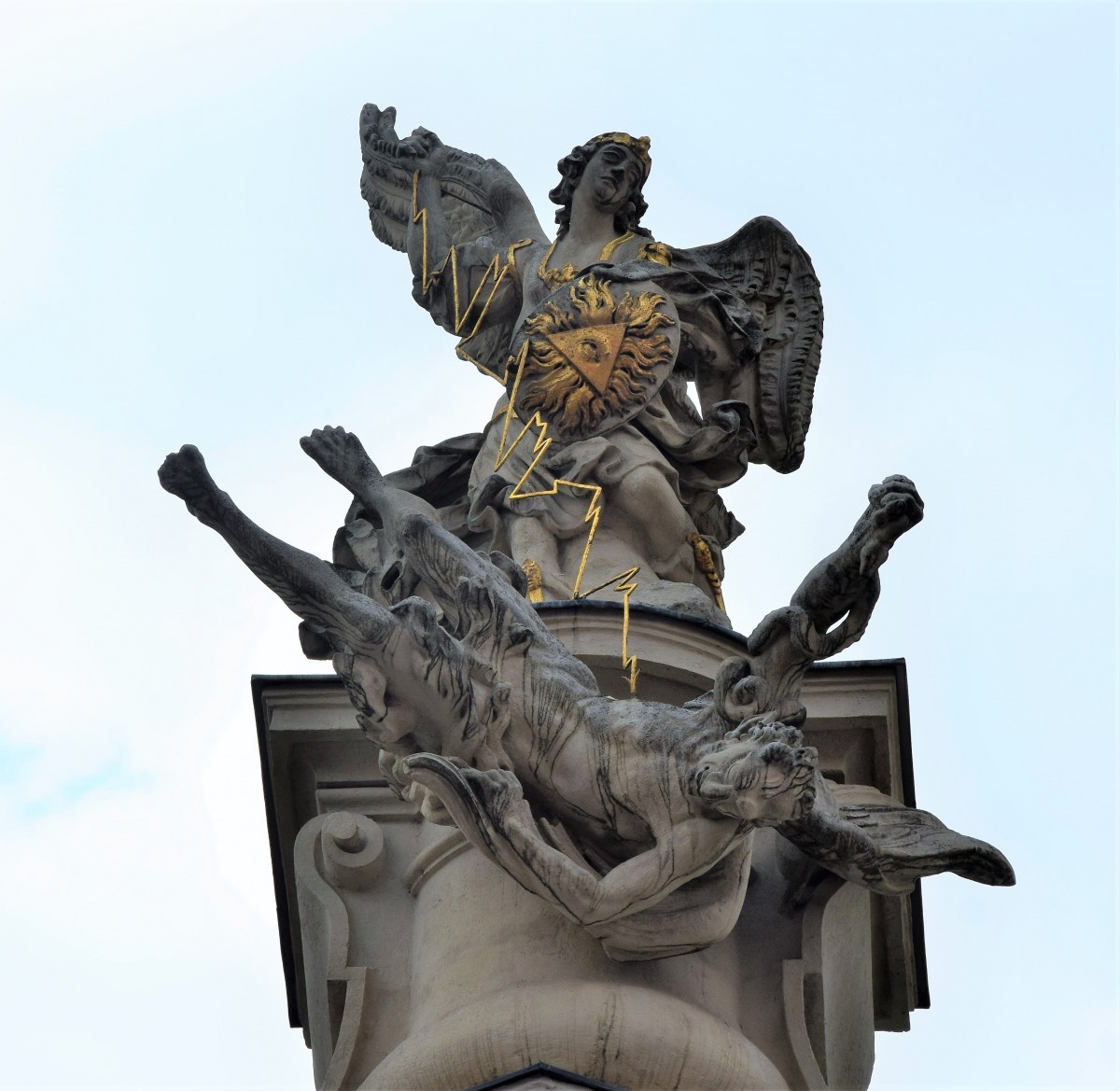 The statue of Archangel Michael and the Fall of the Devil on the pediment, Mariahilf (photo by Christina Pichler, 2018)